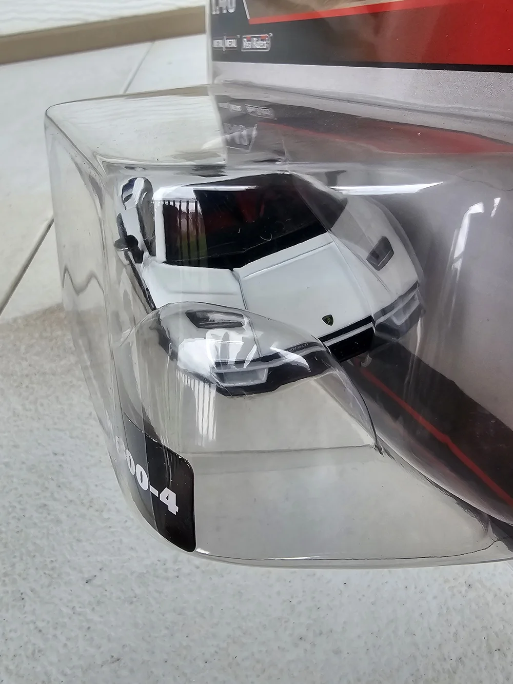 Riders by Lee White & Black Lamborghini Countach LPI 800-4 Die-Cast Toy